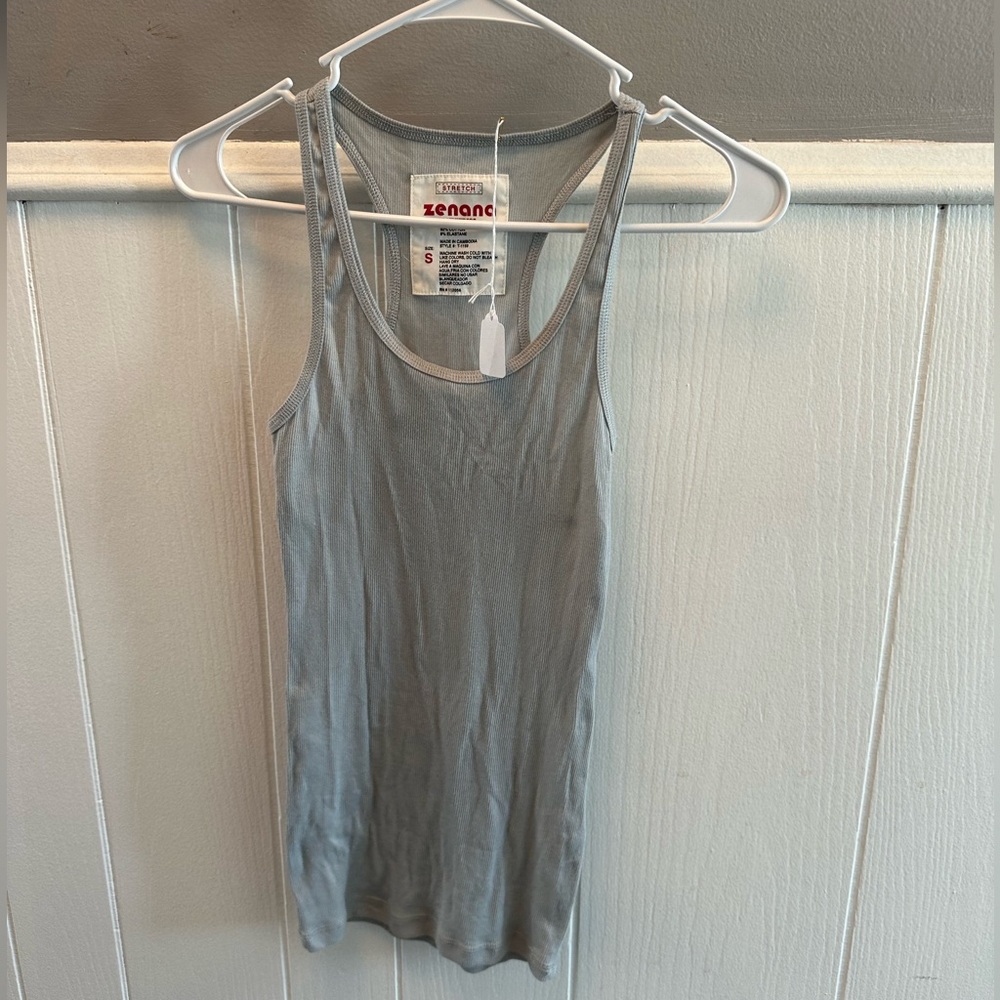 Gray tank top, brand new with tags from boutique. Bought for $10.